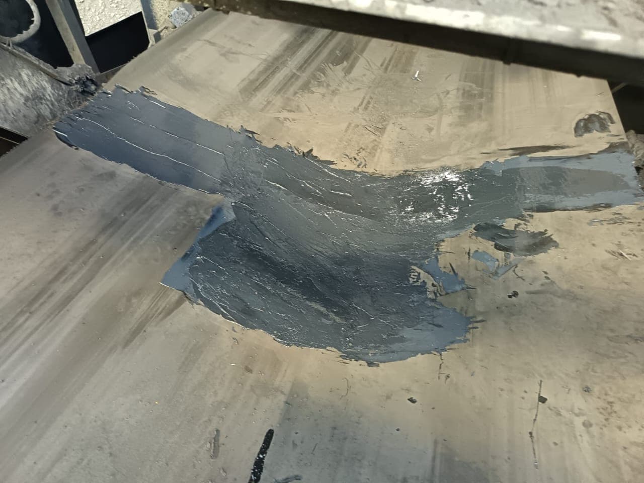 A finished KK-Fix repair feathered smooth into the surrounding belt cover